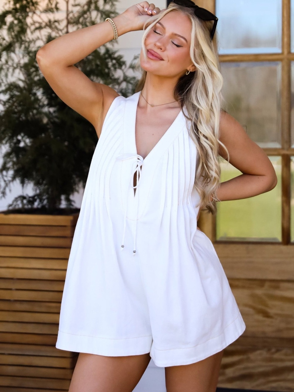 Sleeveless White V-Neck Tie-Front Romper